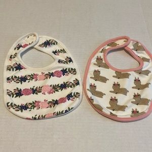 Two cloth bibs. New w/o tags.